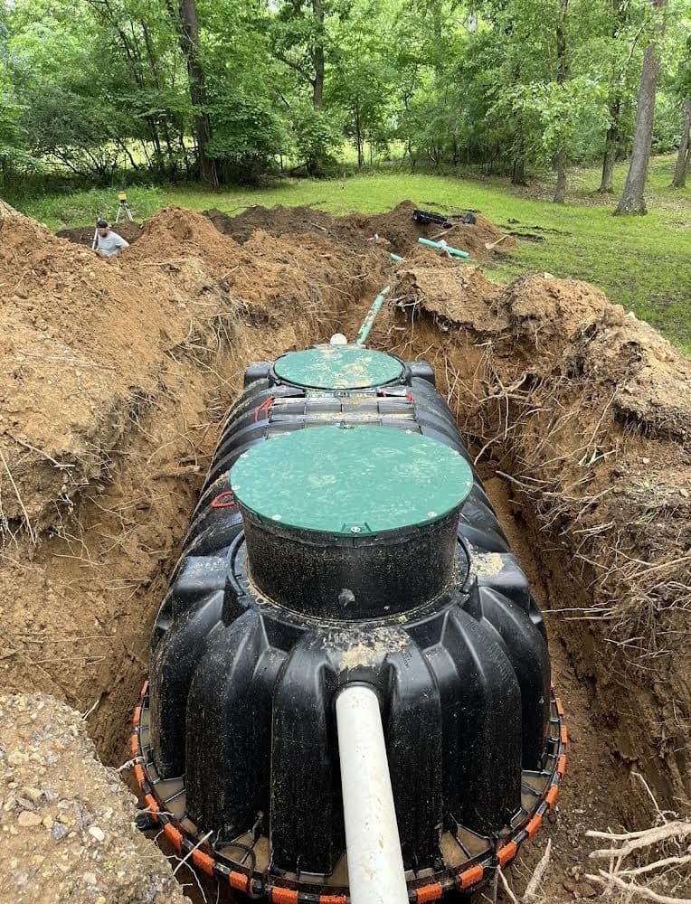 Septic tank installation in an excavated pit
